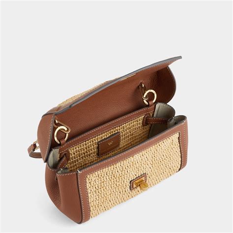 raffia tube shoulder bag